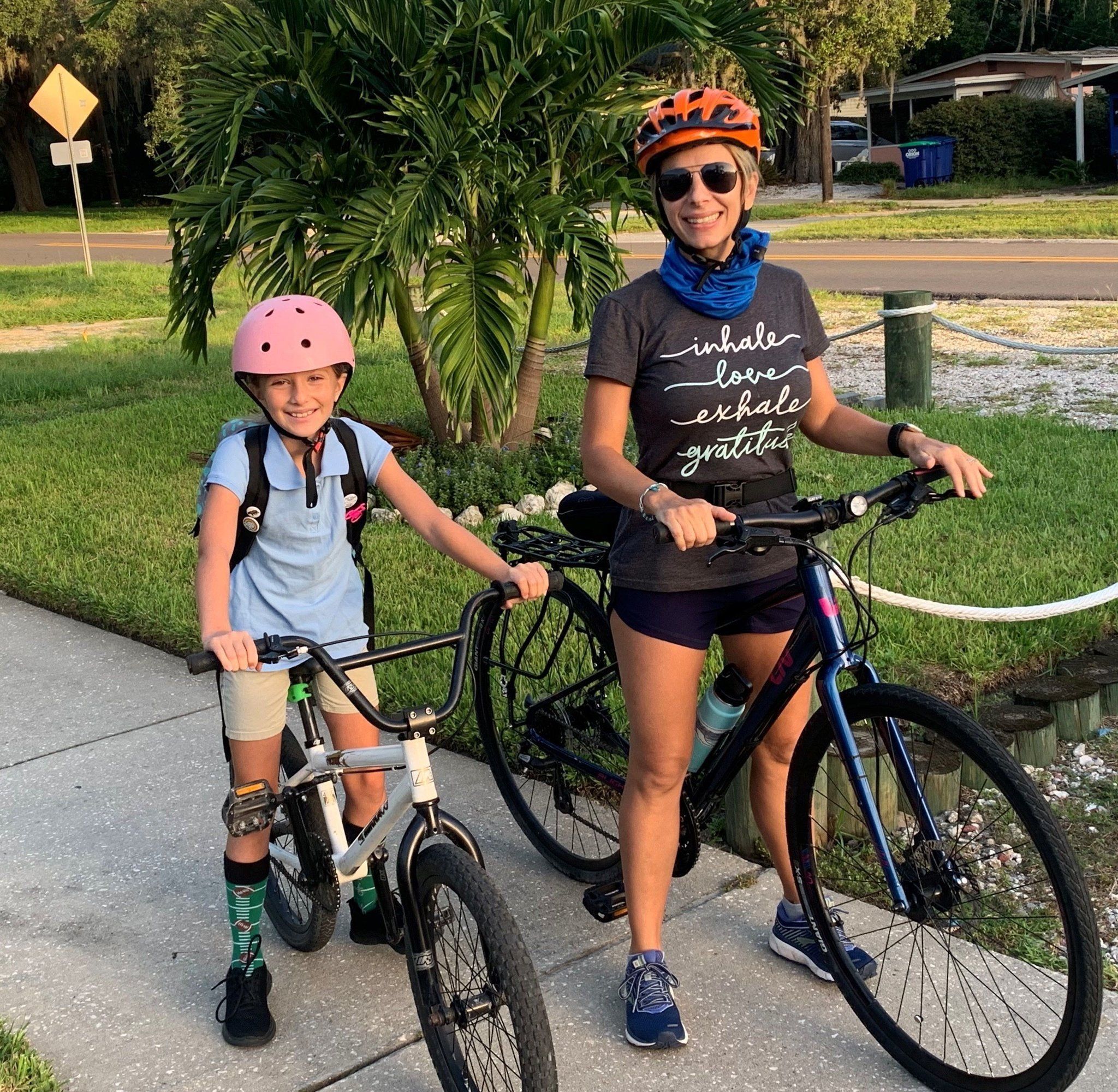 Angela and child on bikes