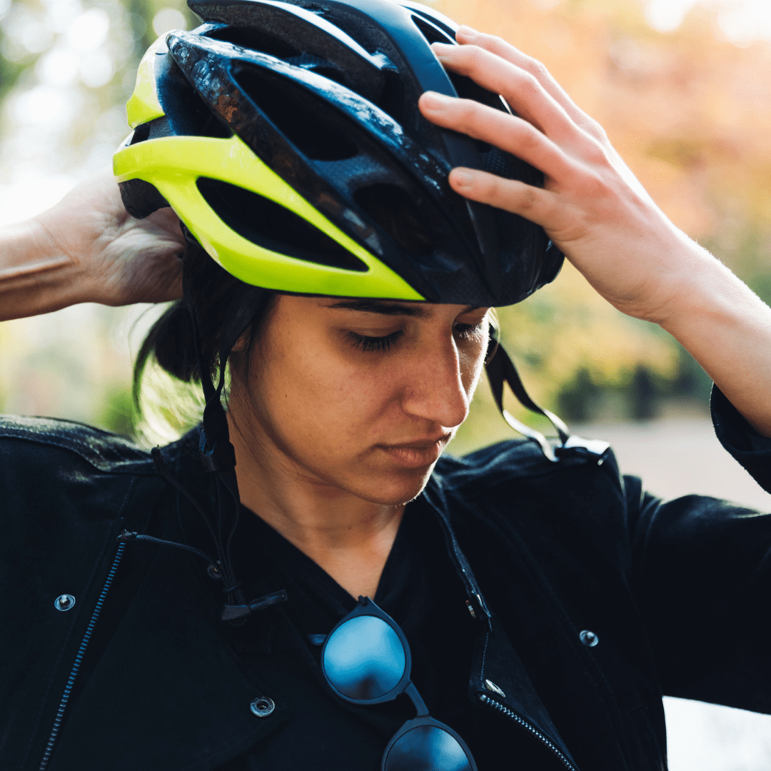 Untitled design - 2022-02-04T214408.574 woman wearing bike helmet